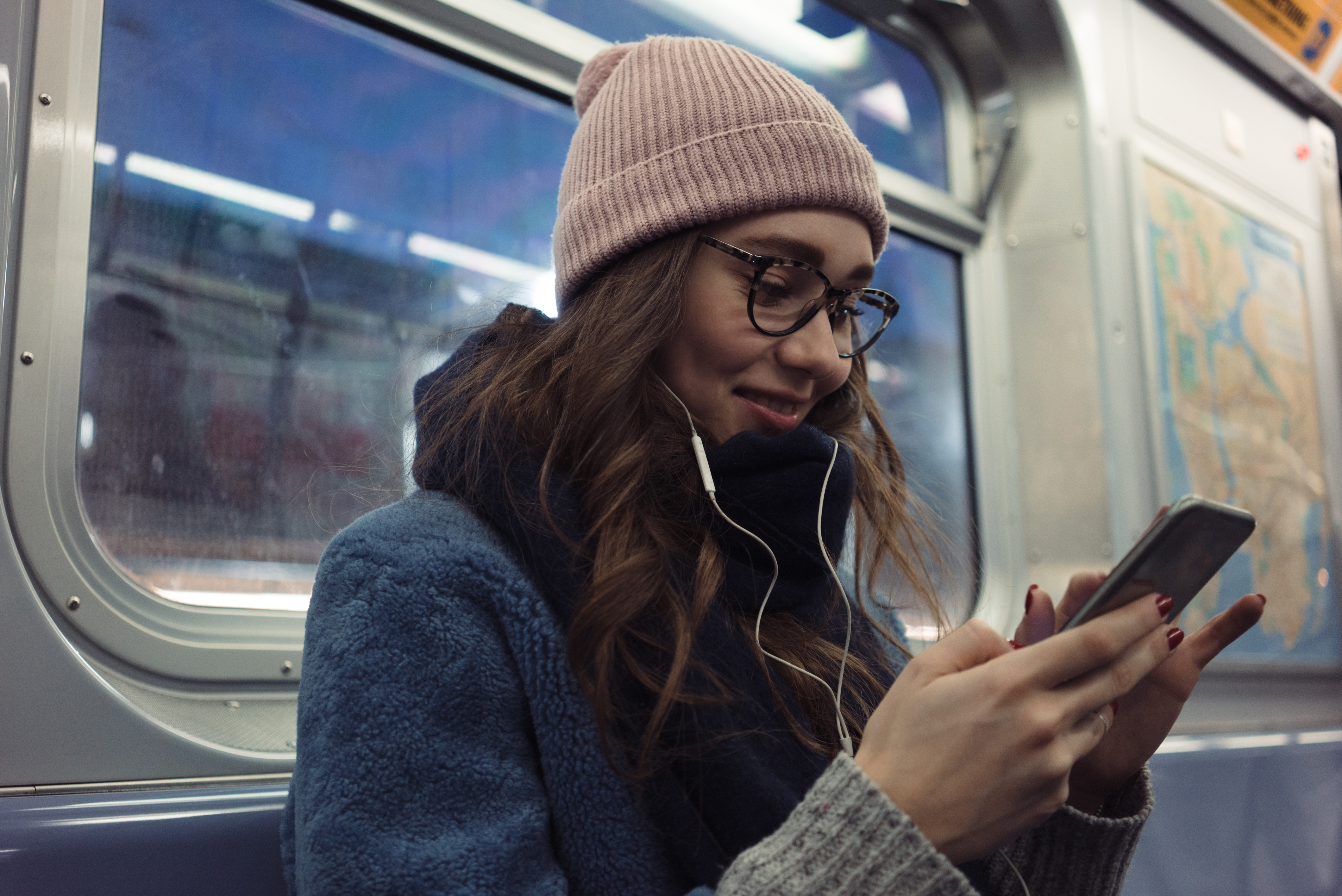 Woman Reading The PAPAA Forum On The Underground