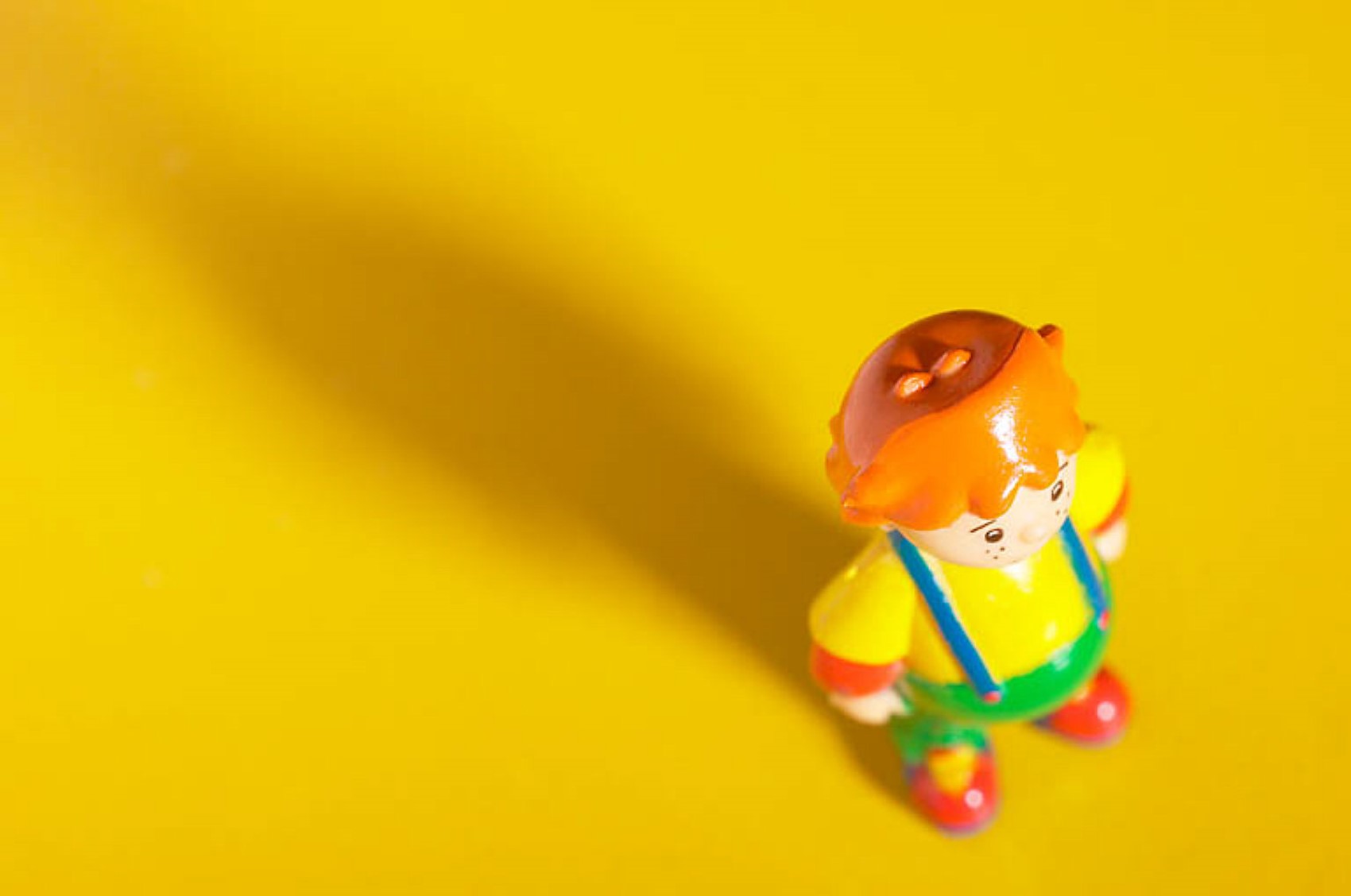 Plastic toy of redhead boy in overalls uid 1172237.jpg