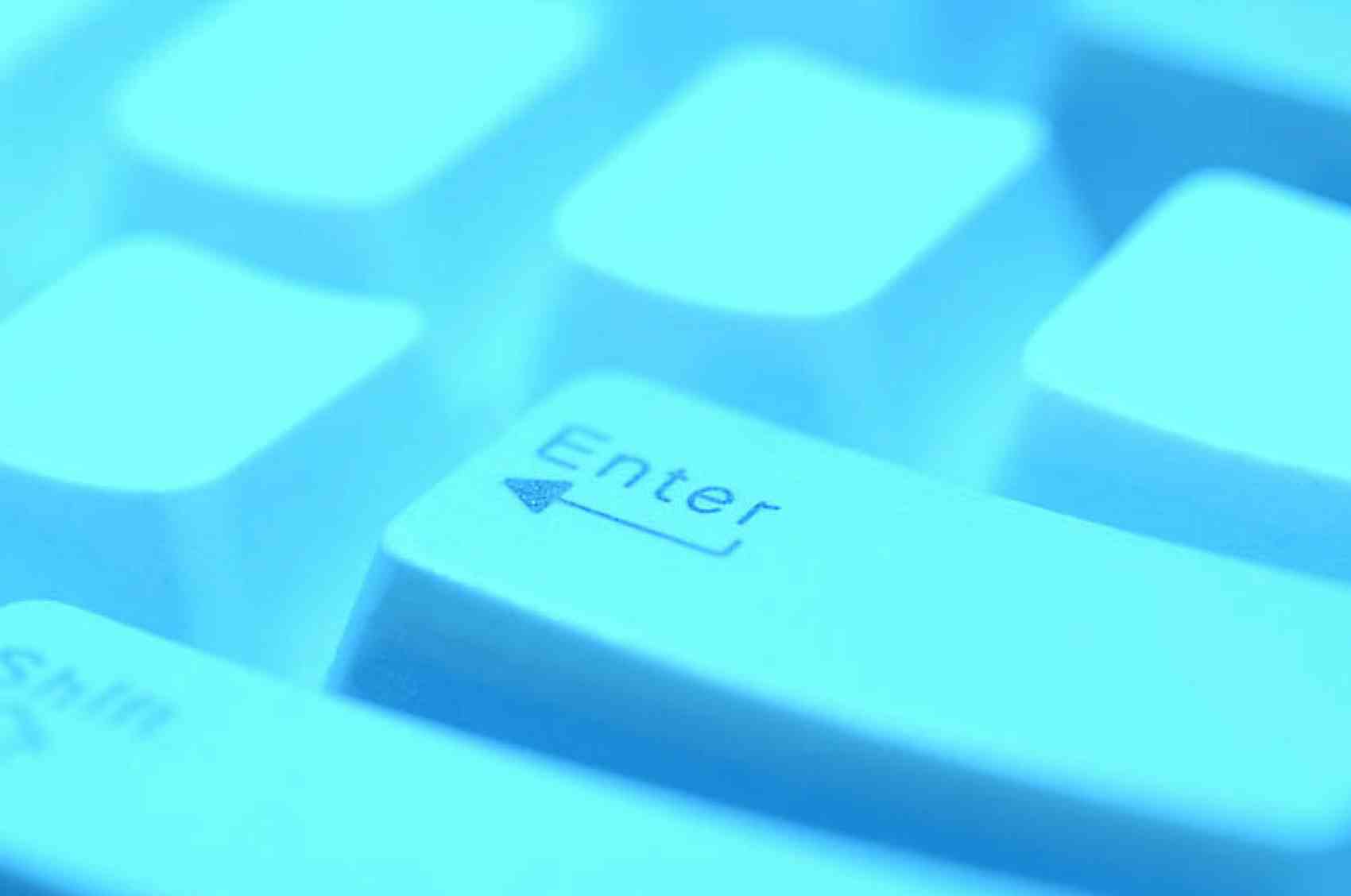 Close up of gray enter button on computer keyboard.jpg