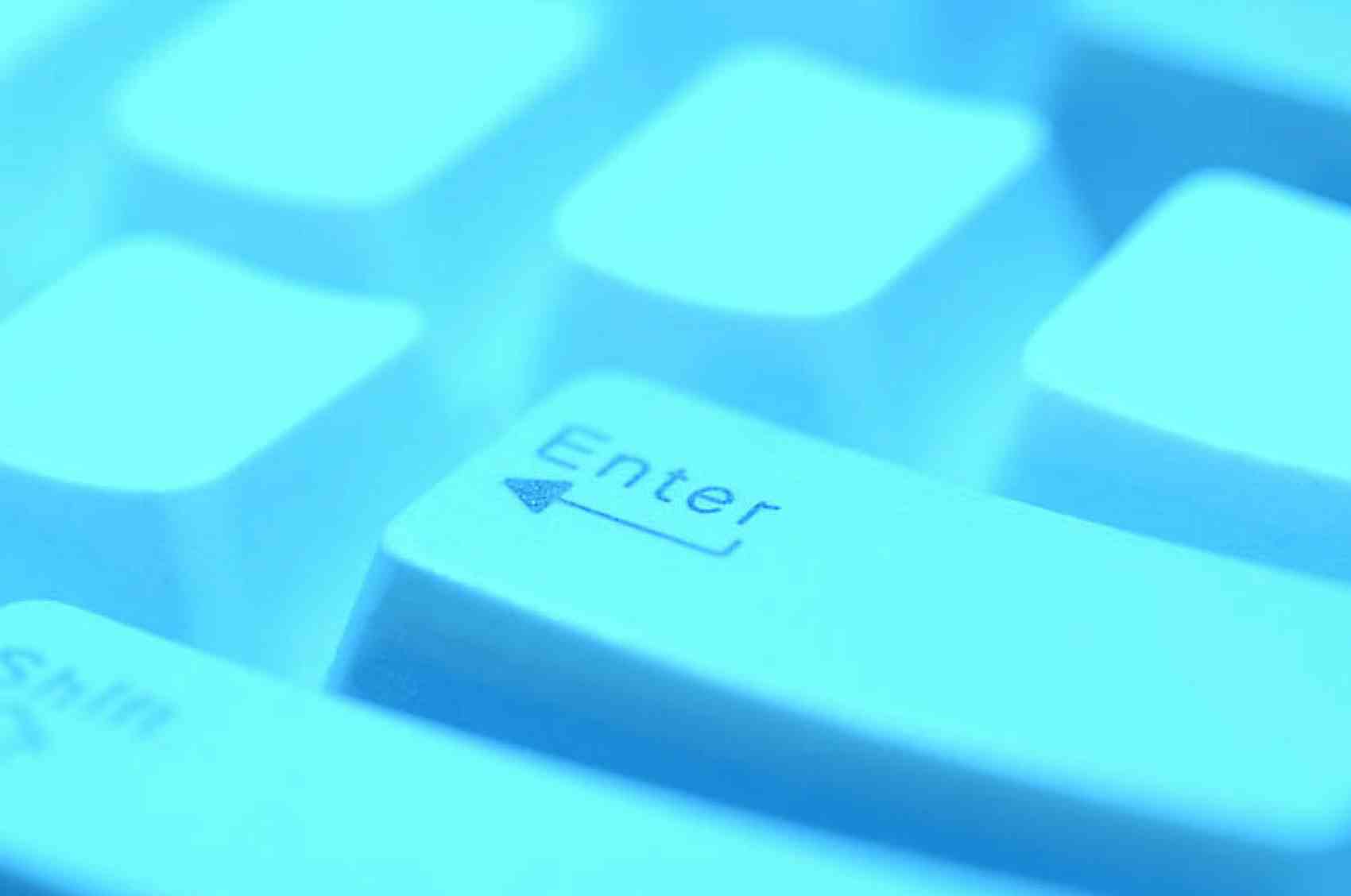 Close up of gray enter button on computer keyboard.jpg